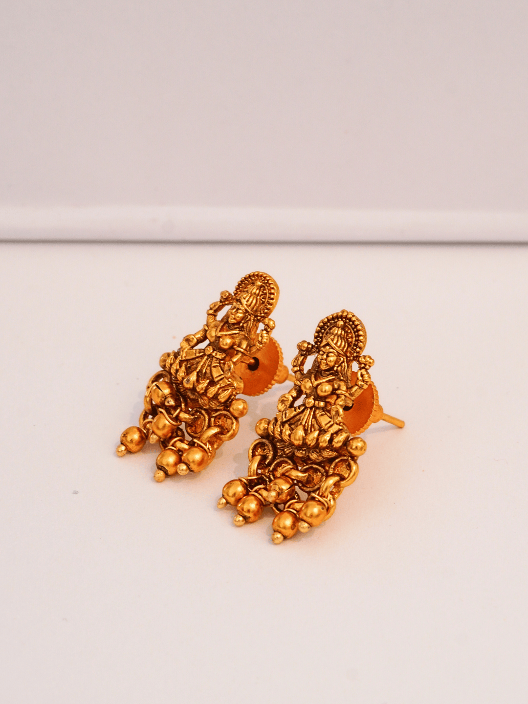 Charming Laxmi Temple Stud Earrings in 22KT Matte Gold