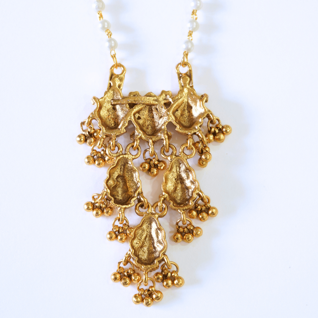Trendsetting Laxmi Pendant in Pearl String Temple Pendant Set
