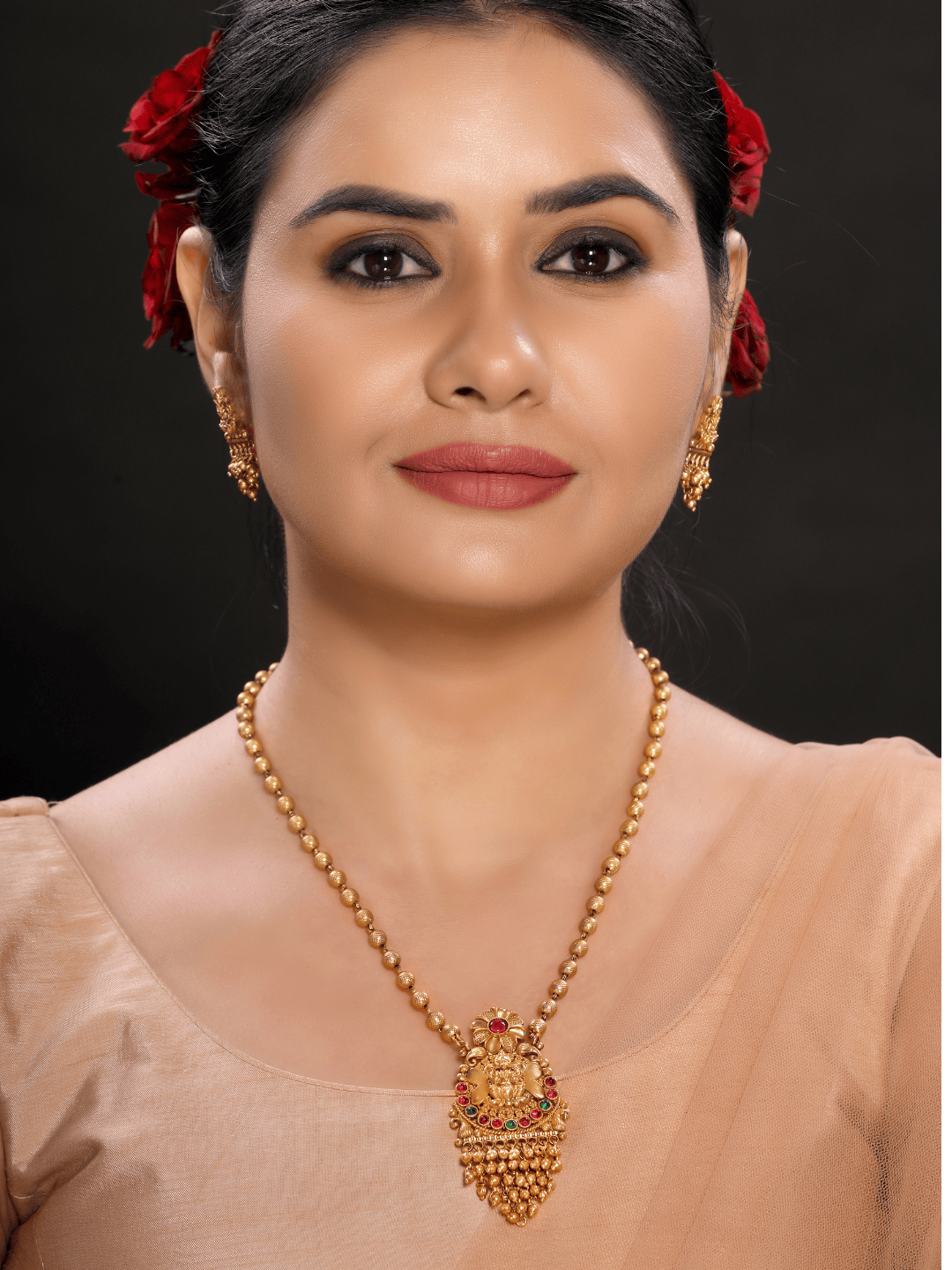 Stunning Golden Motifs Floral Laxmi Temple Pendant Set