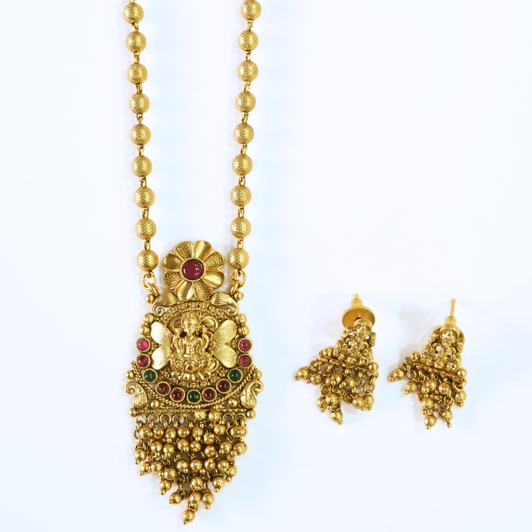 Stunning Golden Motifs Floral Laxmi Temple Pendant Set