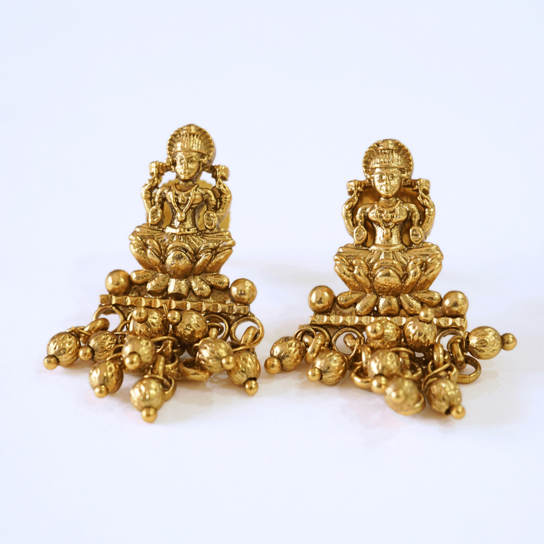 Stunning Golden Motifs Floral Laxmi Temple Pendant Set