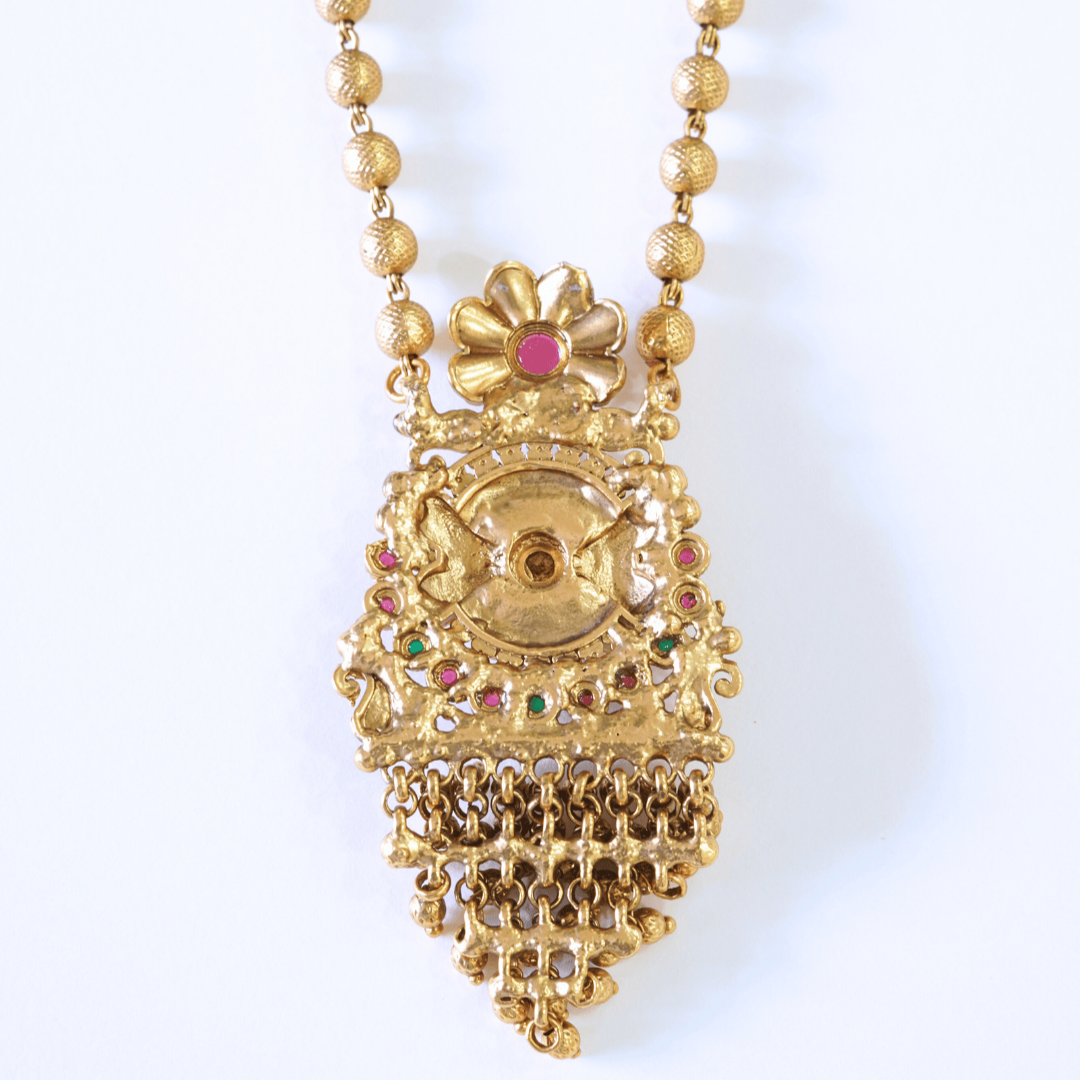 Stunning Golden Motifs Floral Laxmi Temple Pendant Set