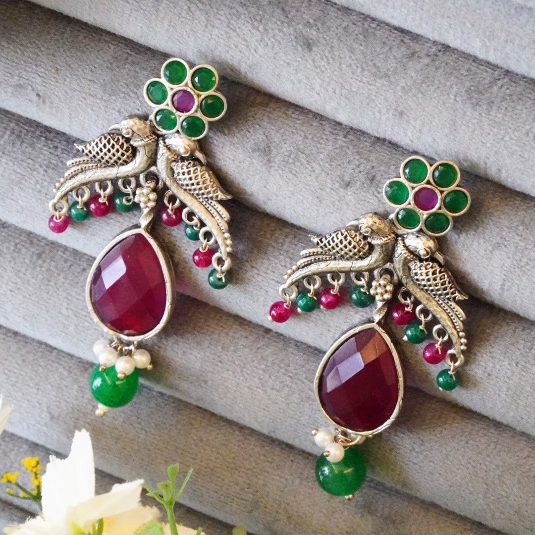 Enchanting Floral Bird Motif Oxidized Dangler Earrings
