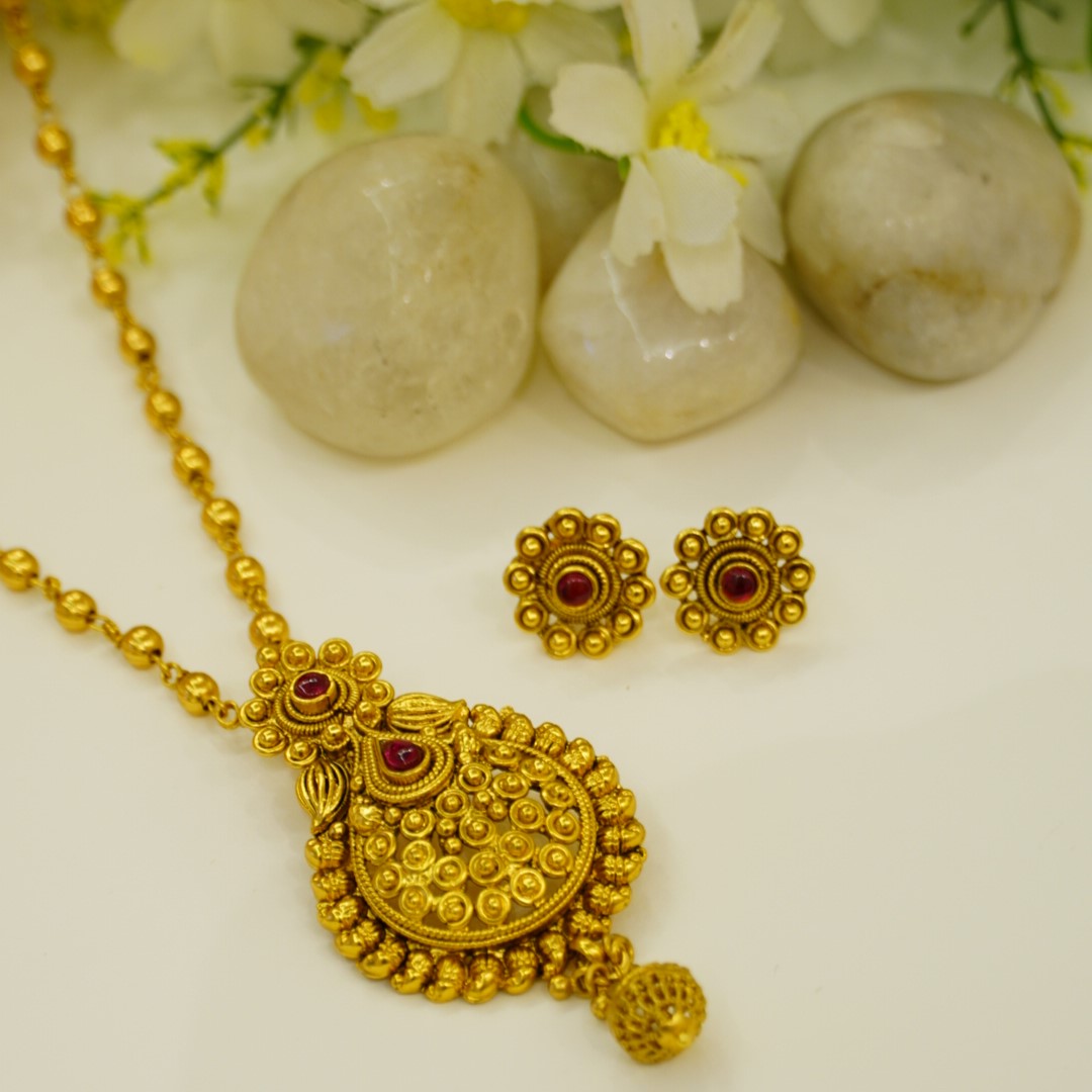 Elegant Drop Shape Ruby Studded Traditional Pendant Set