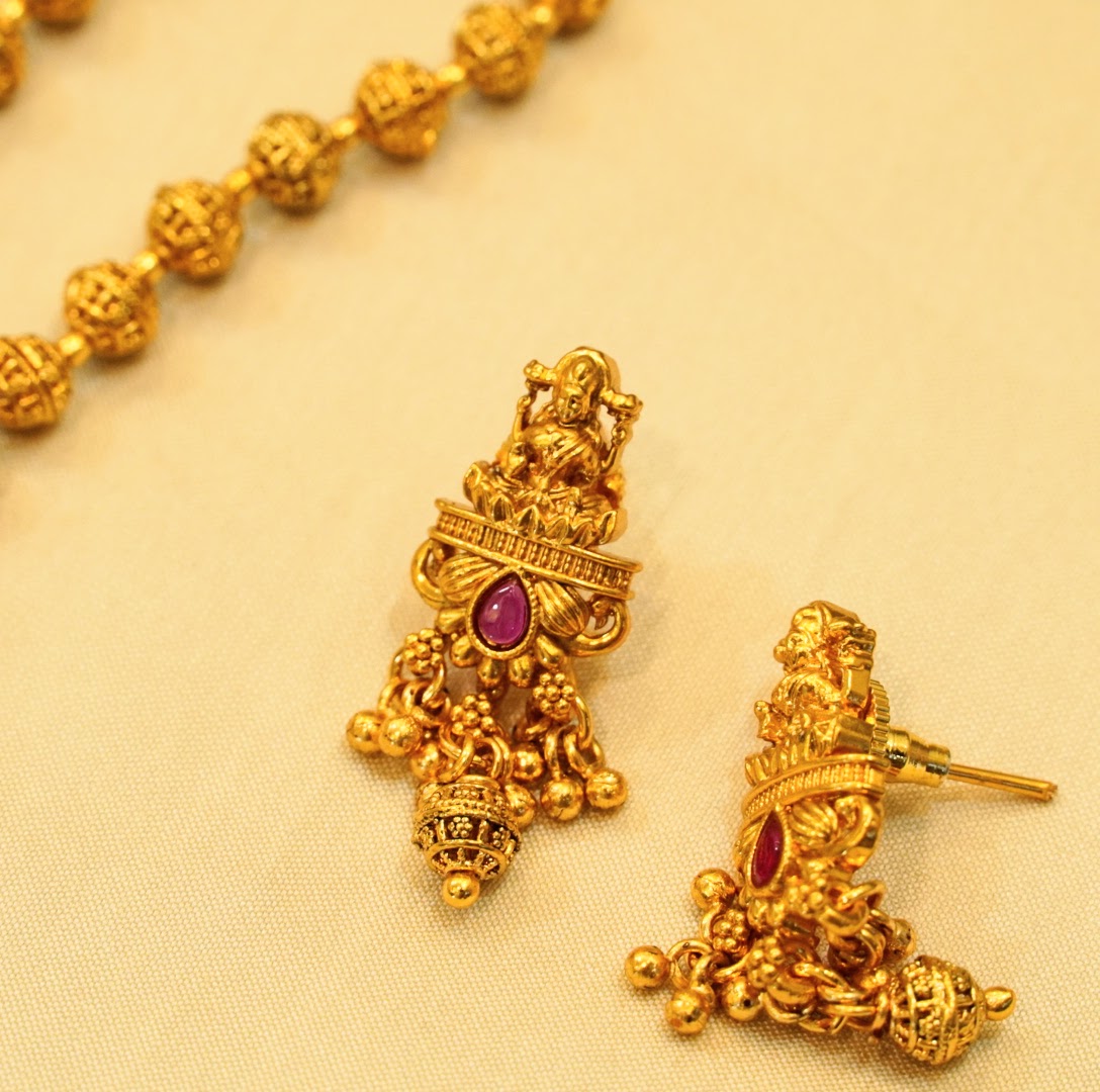 Rubby Studded Laxmi Pendant Temple Set