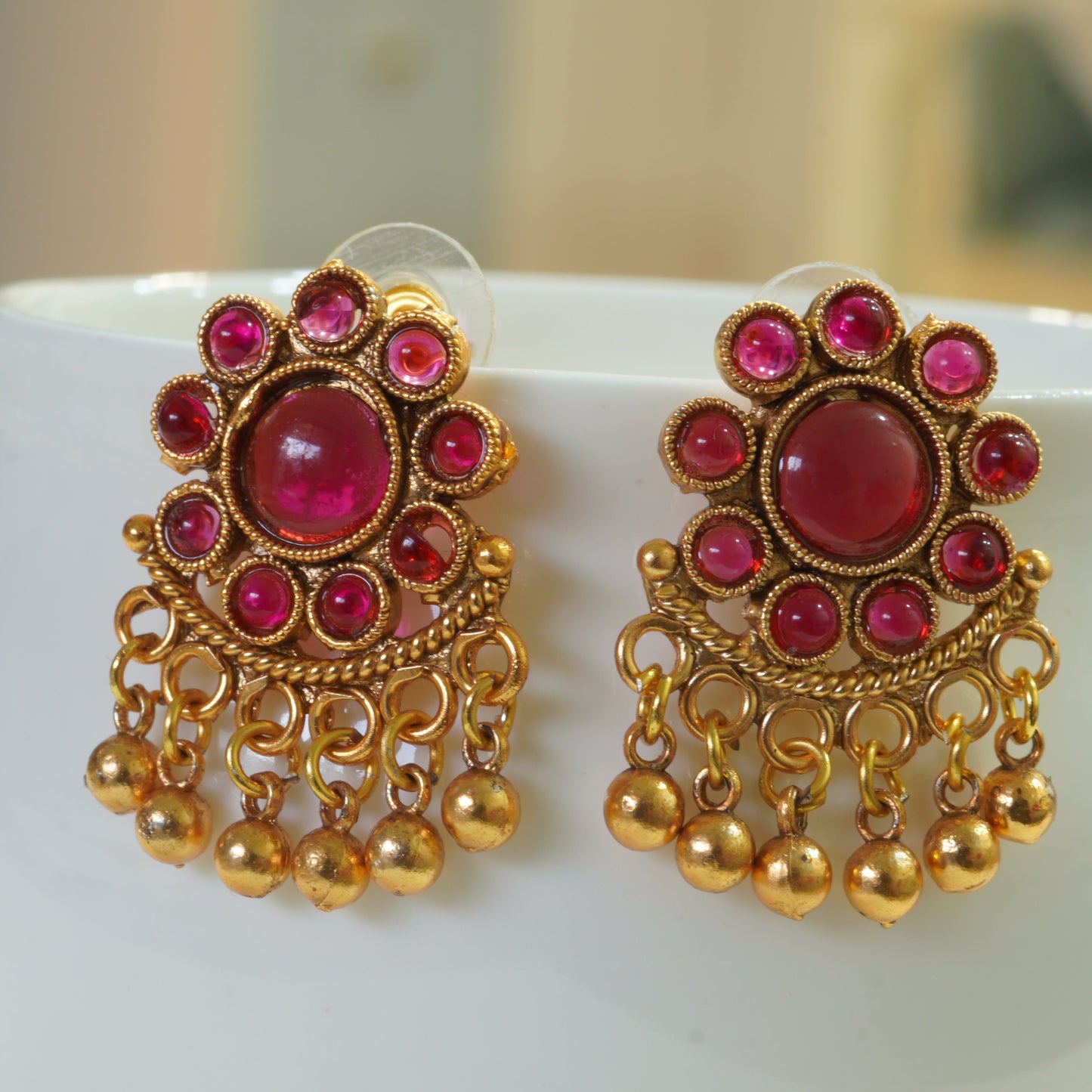 Regal Ruby-Studded Leafy Matte Gold-Plated Traditional Necklace Set