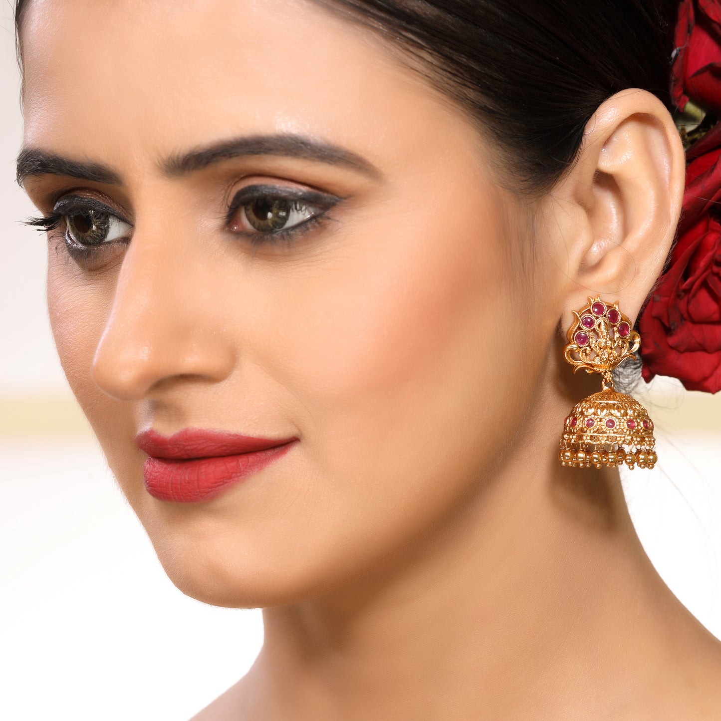 Timeless Faux Ruby Studded 22KT Gold Plated Brass Laxmi Temple Jhumka