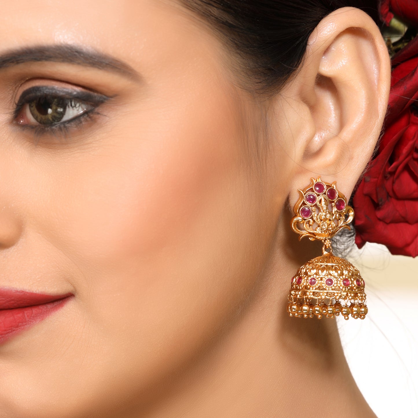 Timeless Faux Ruby Studded 22KT Gold Plated Brass Laxmi Temple Jhumka
