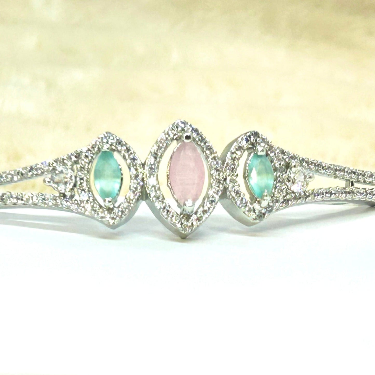 Rhodium Plated Sea Green and Baby Pink Studded Zirconia Bracelet