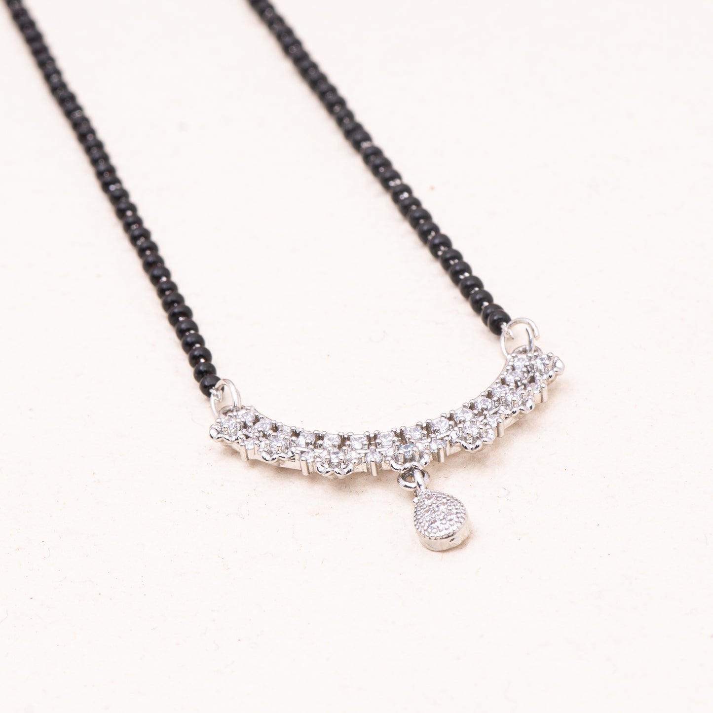 American Diamond Studded Drop Linear Pendant Single Chain Rhodium Plated Mangalsutra