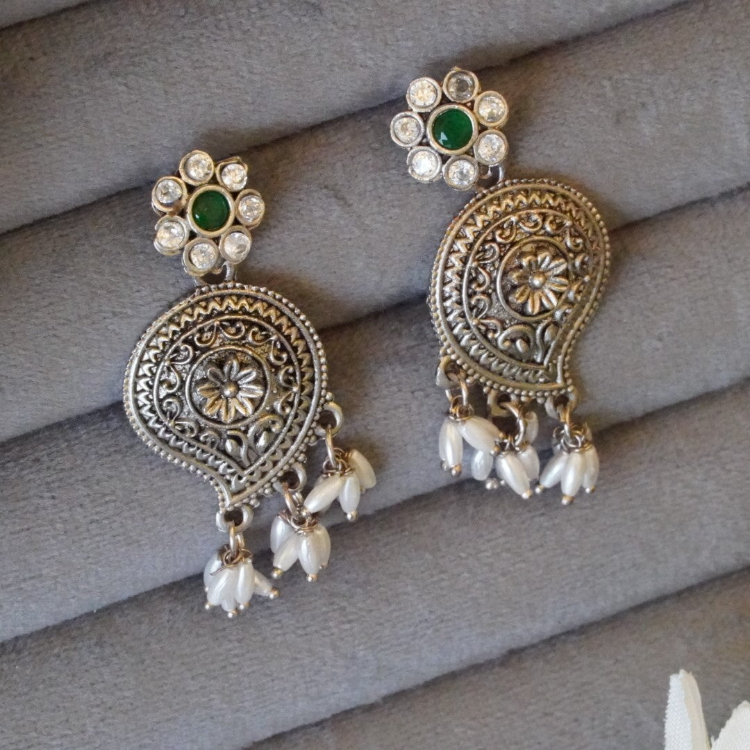 Beautiful Oxidized Leaf Shaped Danglers studded with Jaipuri Stone, Pearl, & American Diamond