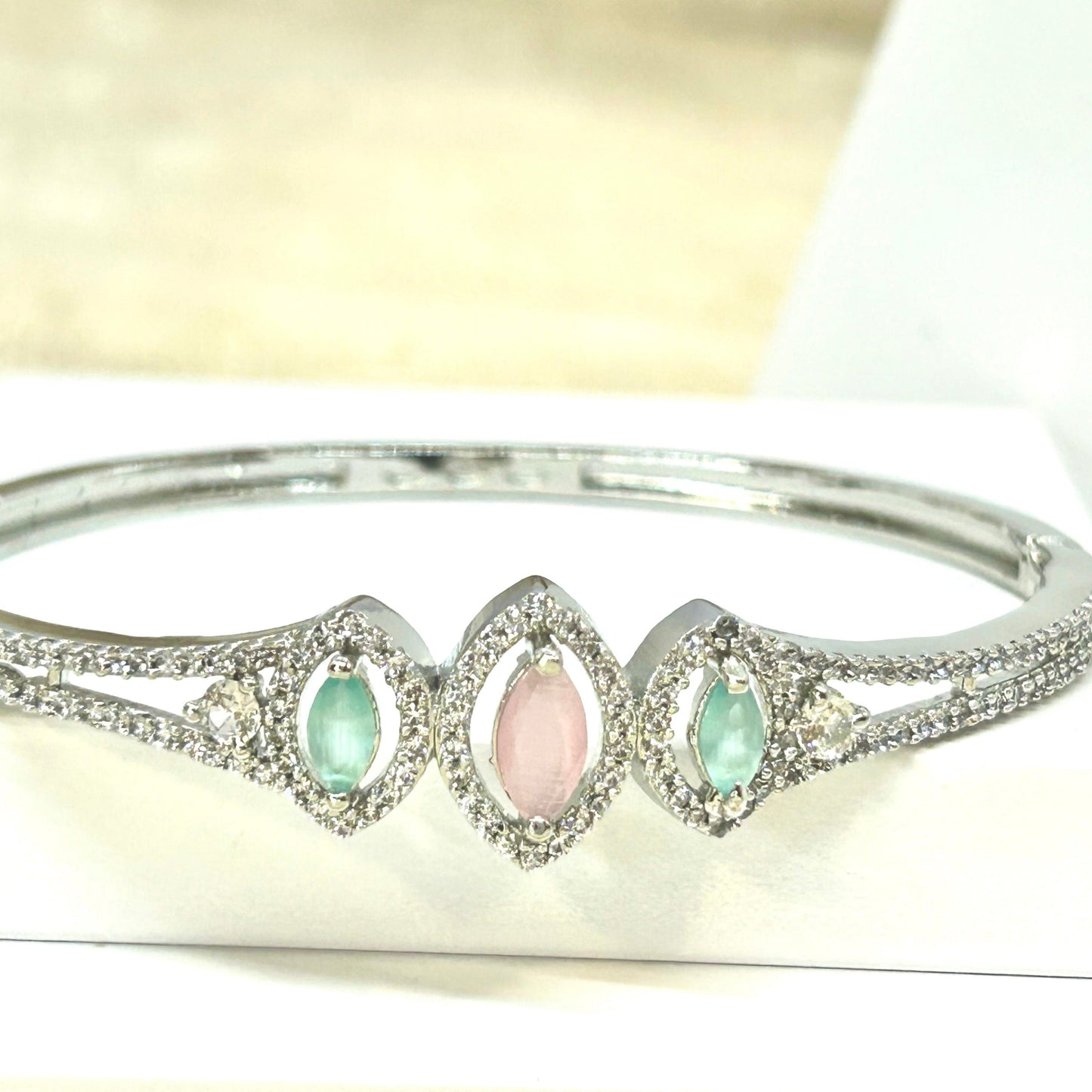 Rhodium Plated Sea Green and Baby Pink Studded Zirconia Bracelet