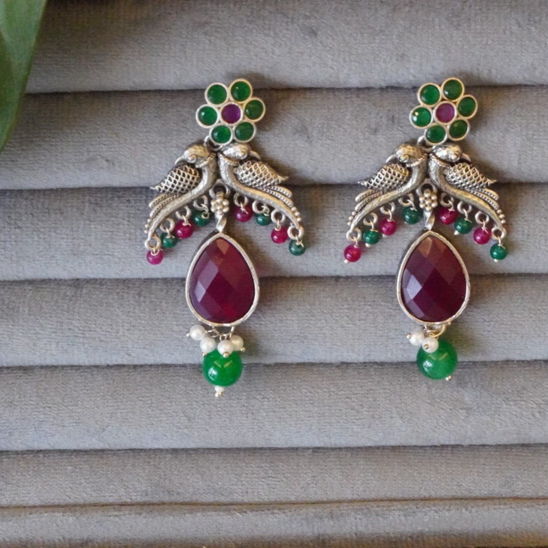 Enchanting Floral Bird Motif Oxidized Dangler Earrings with Lovely Pink & Green Jaipuri Stones & Pearls