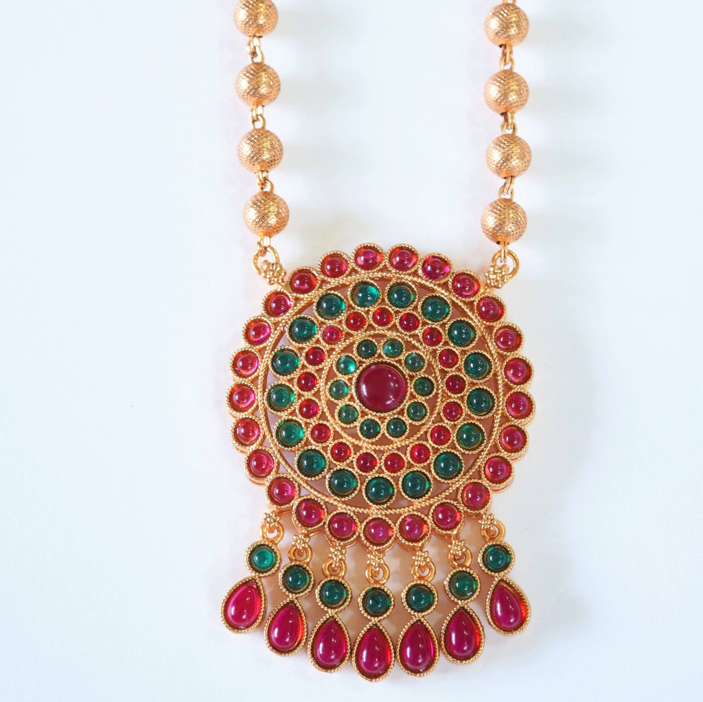 Ruby n Emerald Studded Matte Gold Finish Traditional Pendant Set