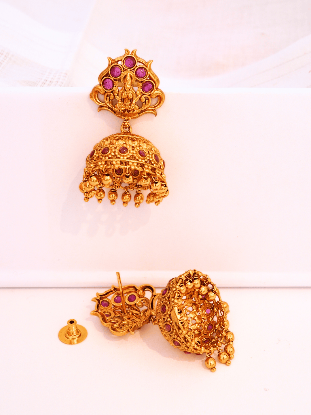 Timeless Faux Ruby Studded 22KT Gold Plated Brass Laxmi Temple Jhumka