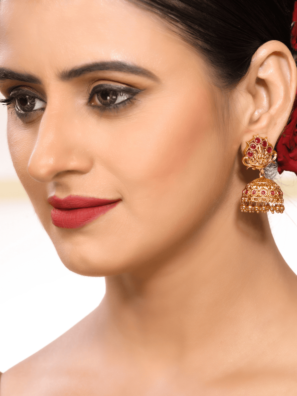 Timeless Faux Ruby Studded 22KT Gold Plated Brass Laxmi Temple Jhumka