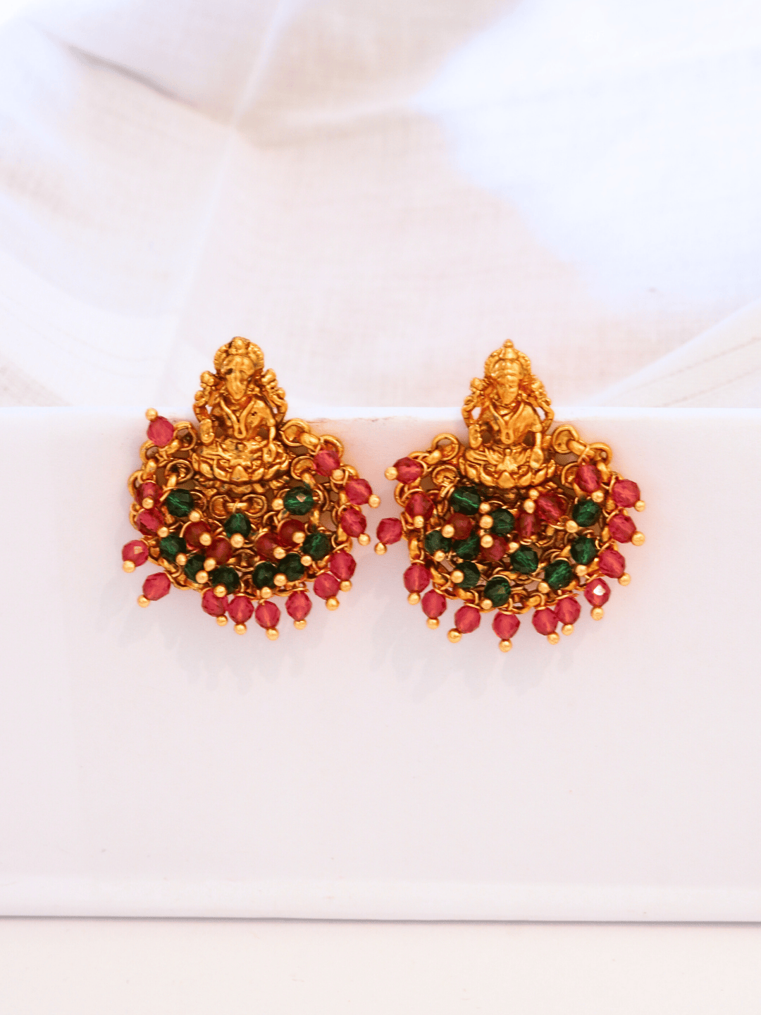 Ethnic Laxmi Temple Brass Studs with Red & Green Crystals in 22KT Gold Matte