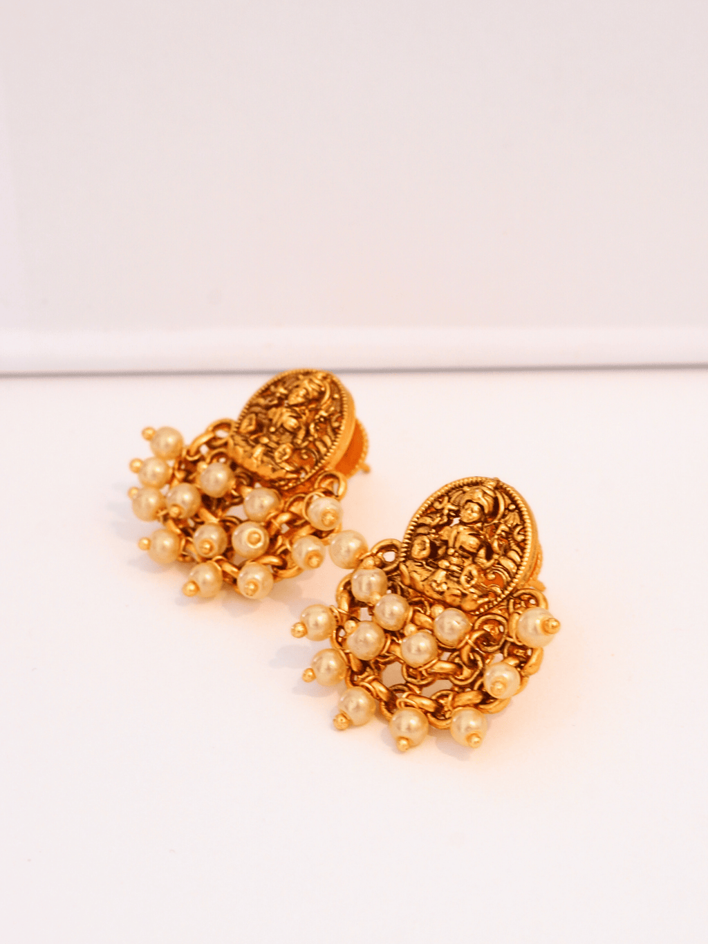 Vintage Laxmi Traditional Studs with White Pearls in 22KT Matte Gold