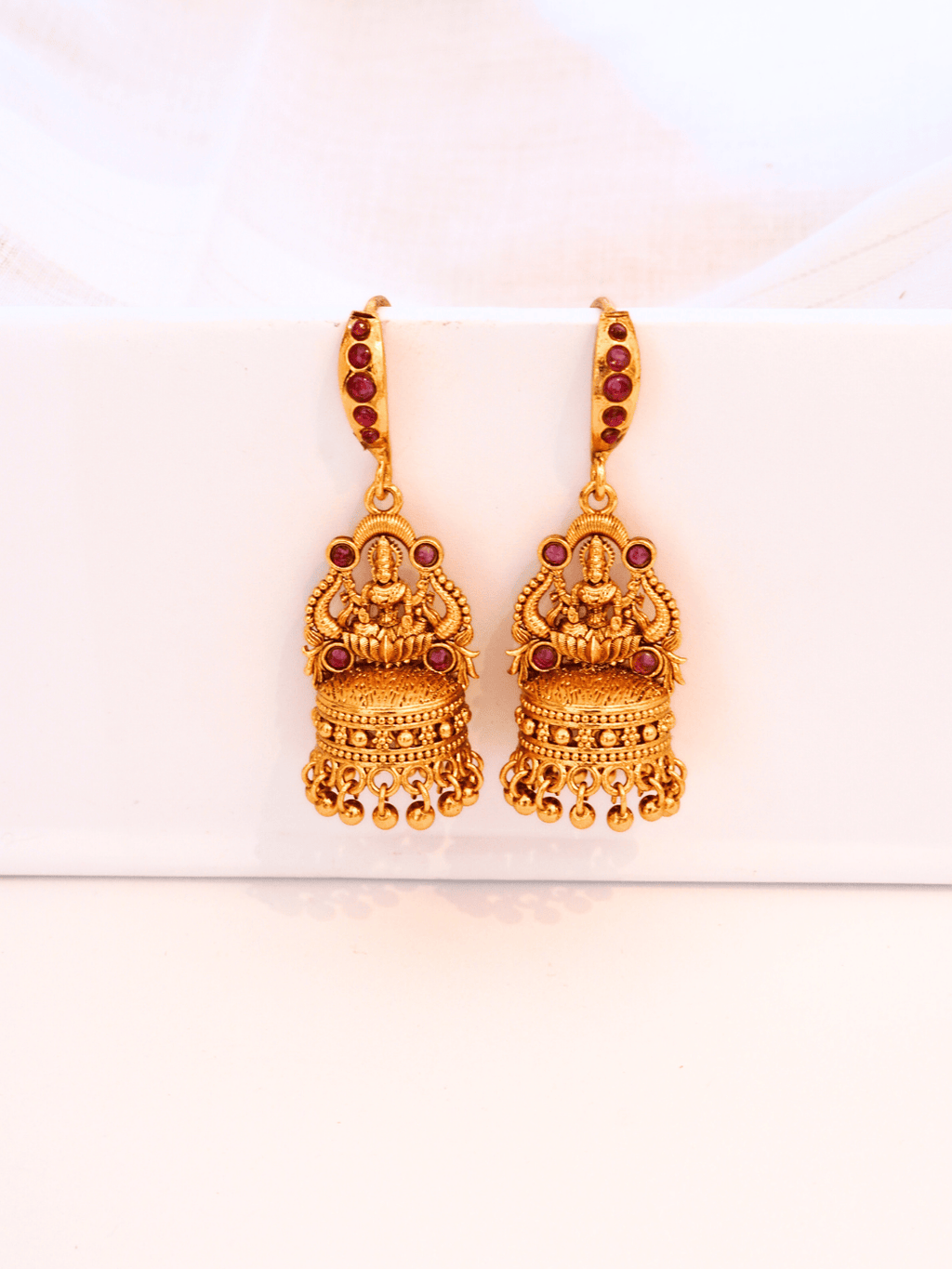 Radiant Linear Faux Ruby Studded Laxmi Jhumka Earrings