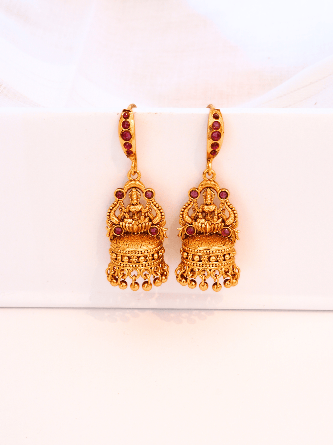 Radiant Linear Faux Ruby Studded Laxmi Jhumka Earrings