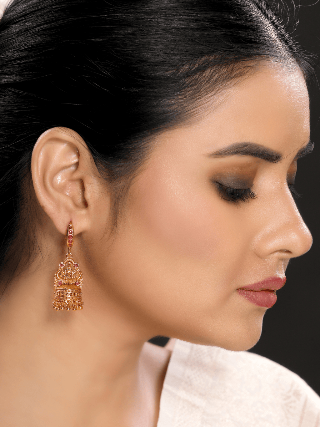 Radiant Linear Faux Ruby Studded Laxmi Jhumka Earrings