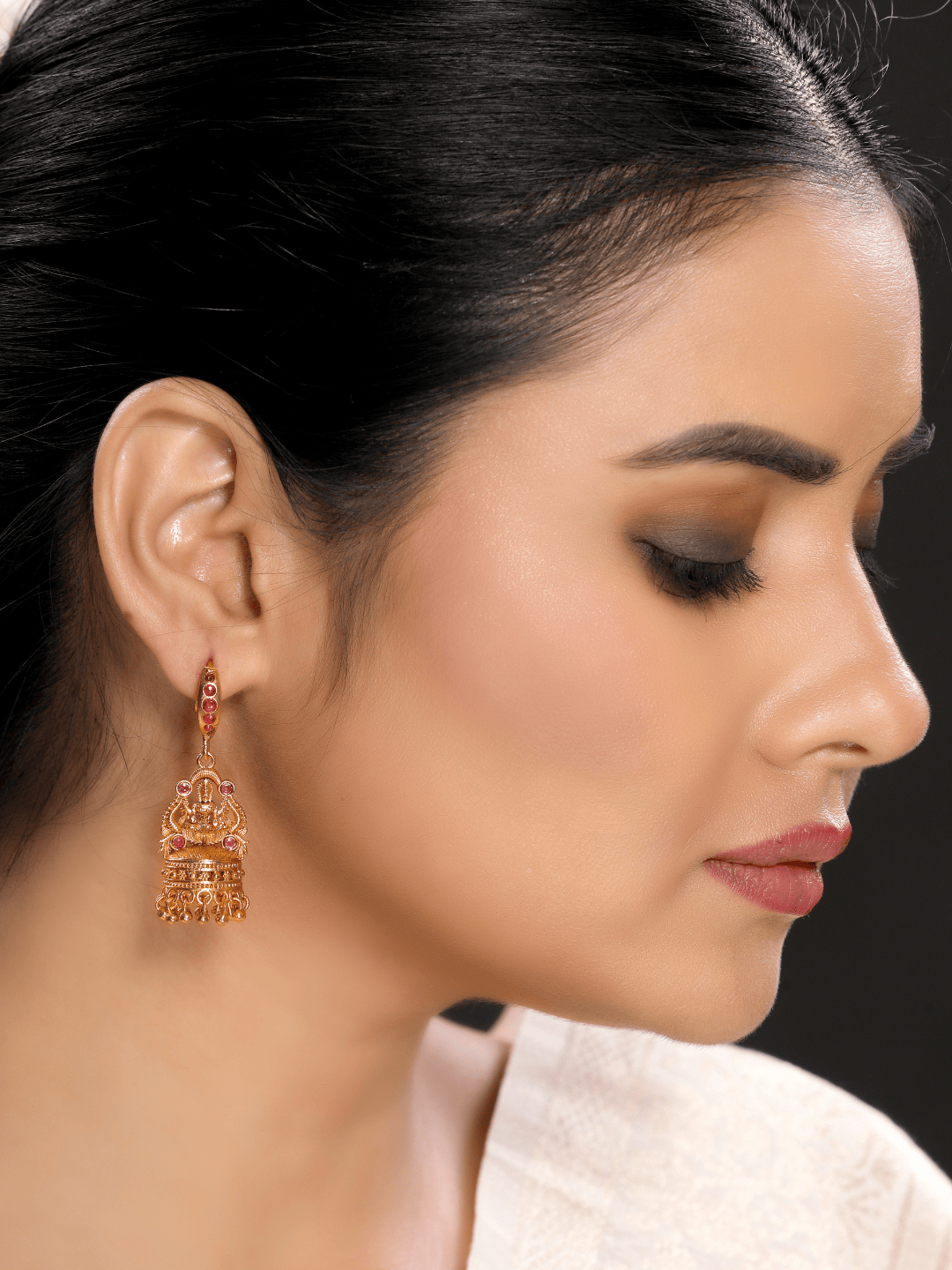 Radiant Linear Faux Ruby Studded Laxmi Jhumka Earrings