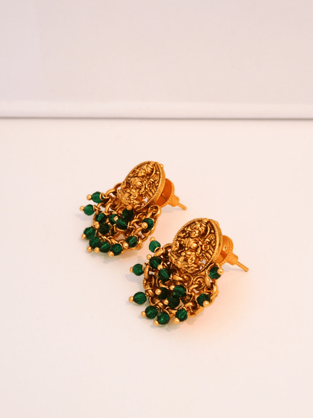 Elegant Laxmi Temple Studs with Green Crystals in 22KT Gold Matte