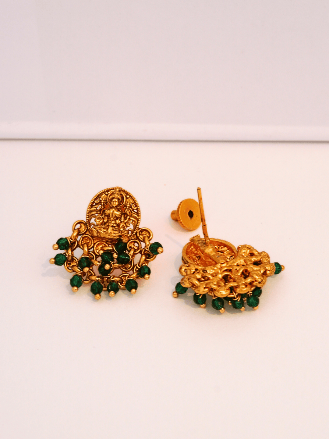 Elegant Laxmi Temple Studs with Green Crystals in 22KT Gold Matte