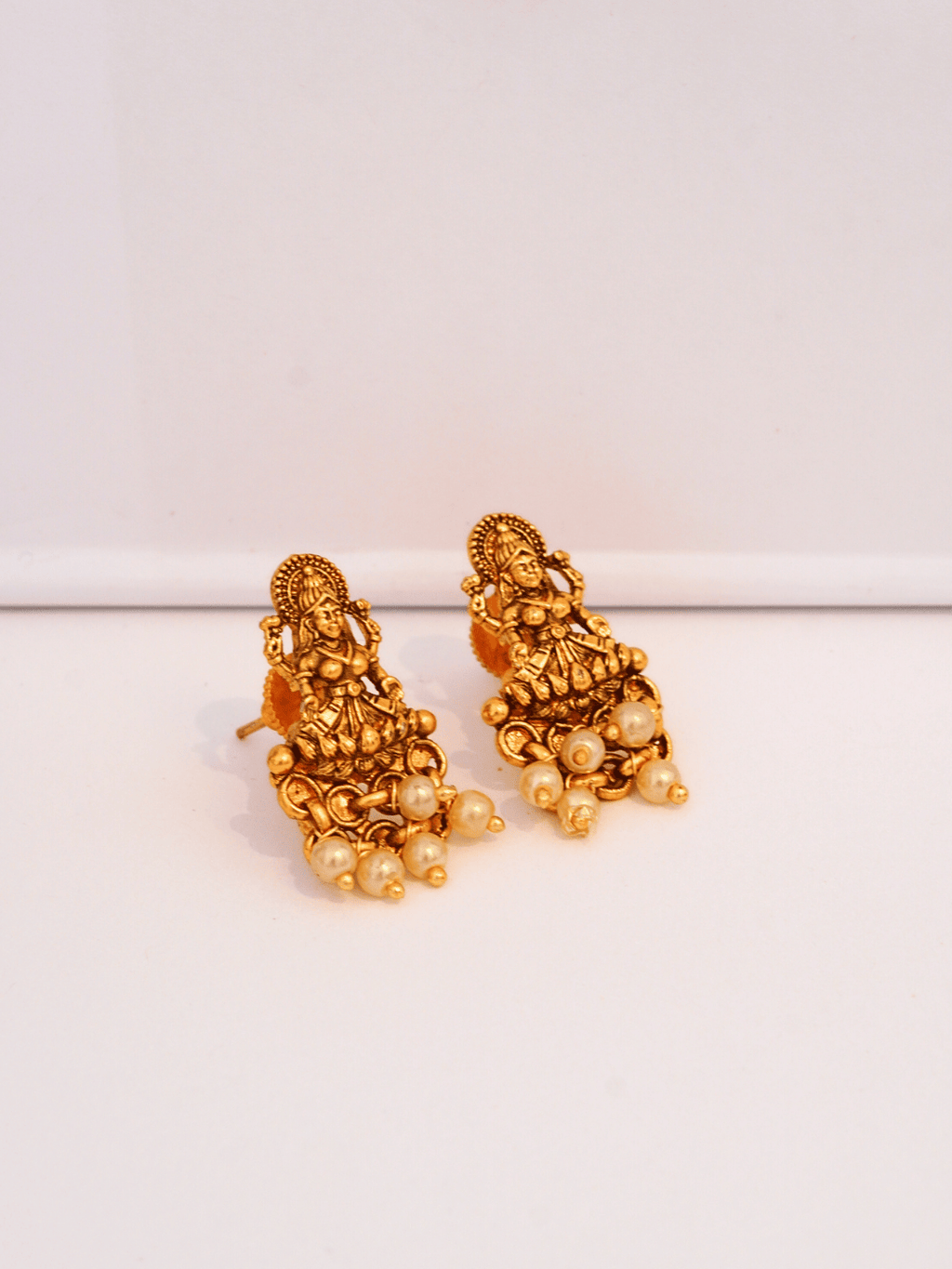 Laxmi Temple Studs with Ivory Pearls in 22K Matte Gold Finish