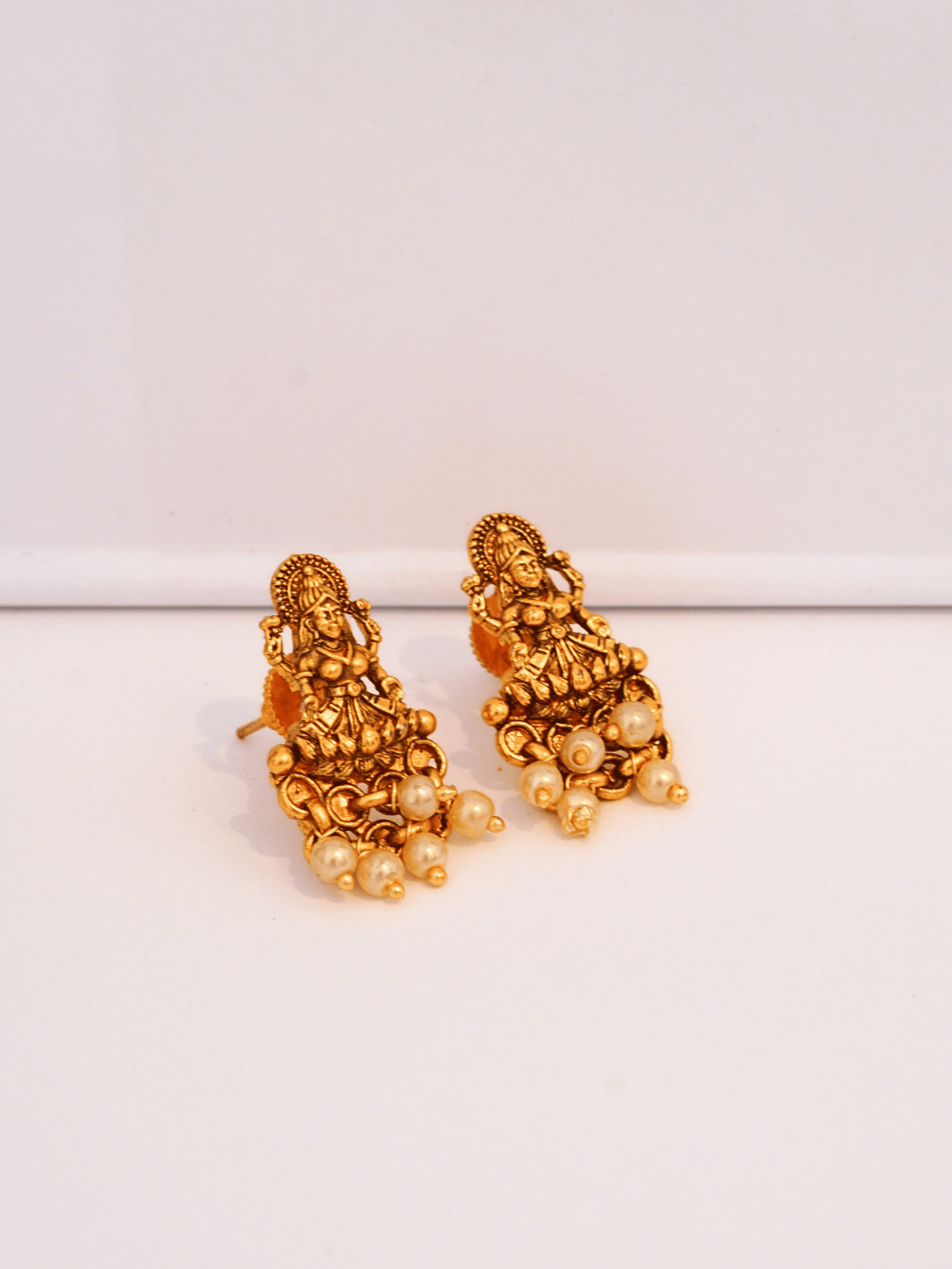 Laxmi Temple Studs with Ivory Pearls in 22K Matte Gold Finish