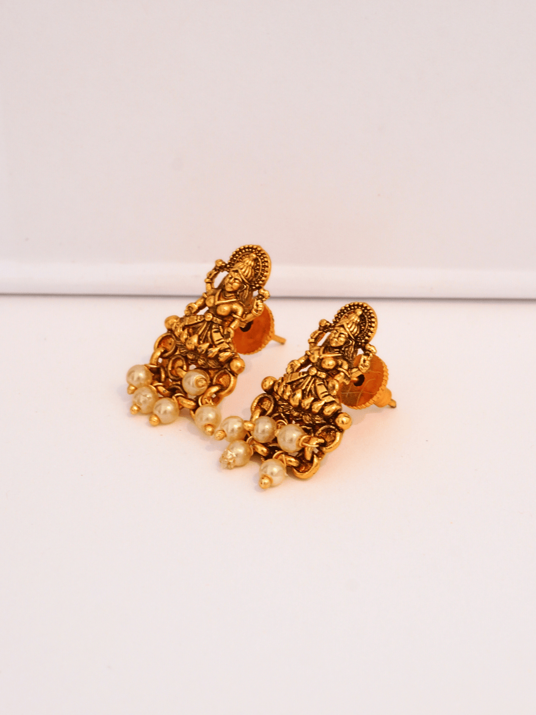 Laxmi Temple Studs with Ivory Pearls in 22K Matte Gold Finish