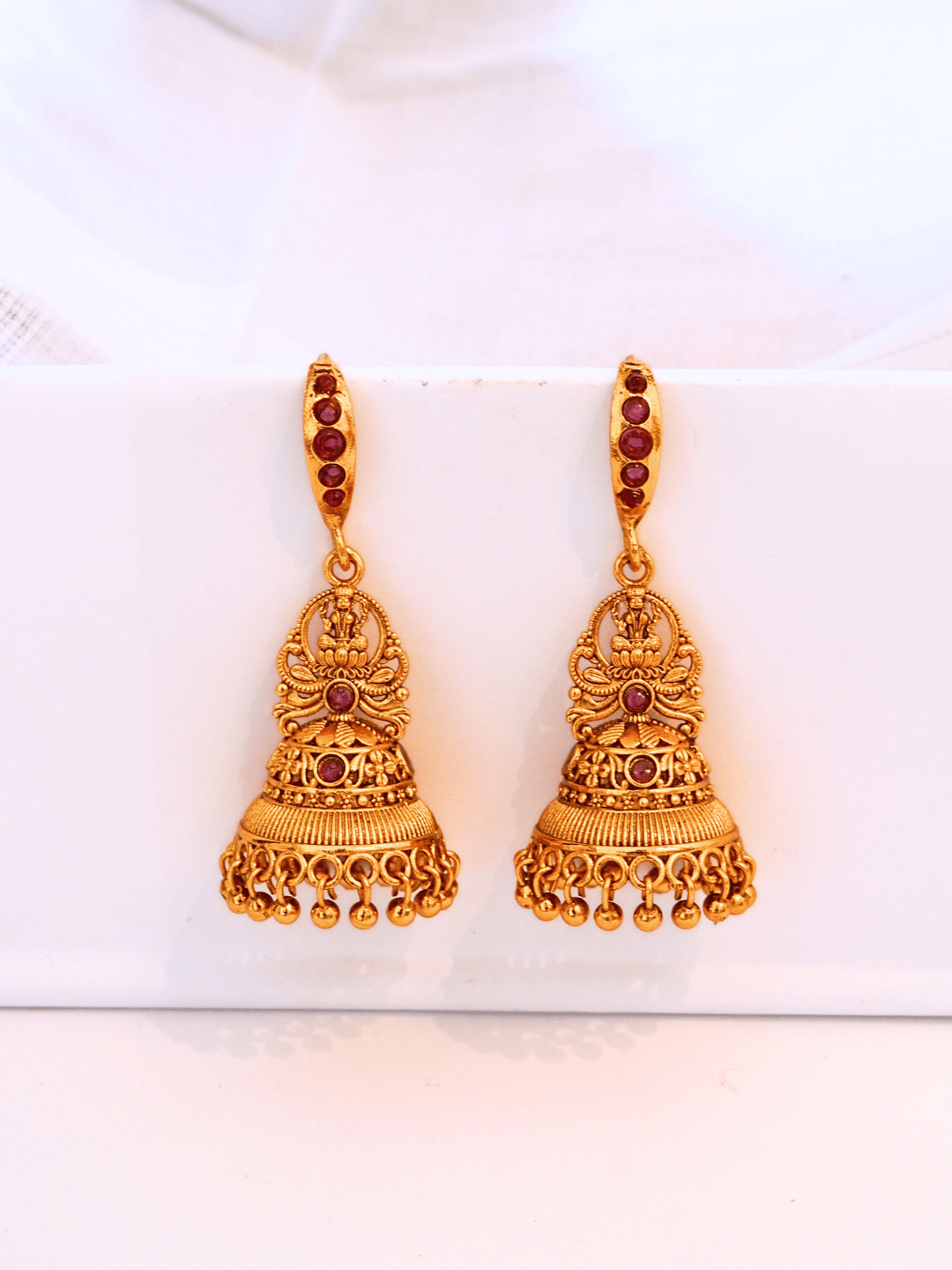 Linear Laxmi Temple Jhumka Earrings | 8KT Matte Gold-Plated Finish