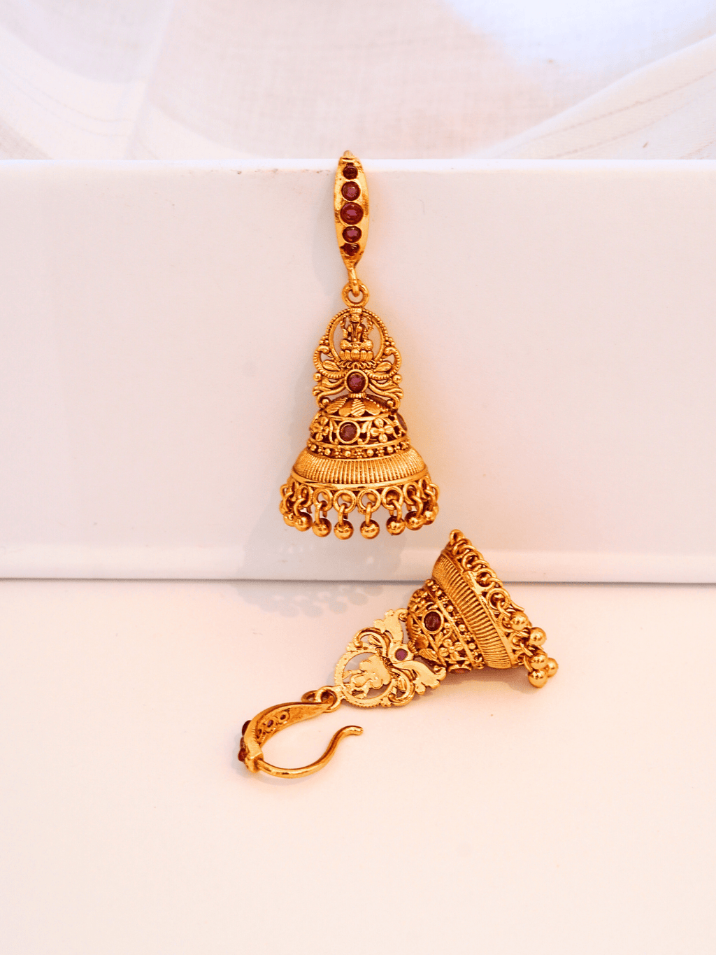 Linear Laxmi Temple Jhumka Earrings | 8KT Matte Gold-Plated Finish