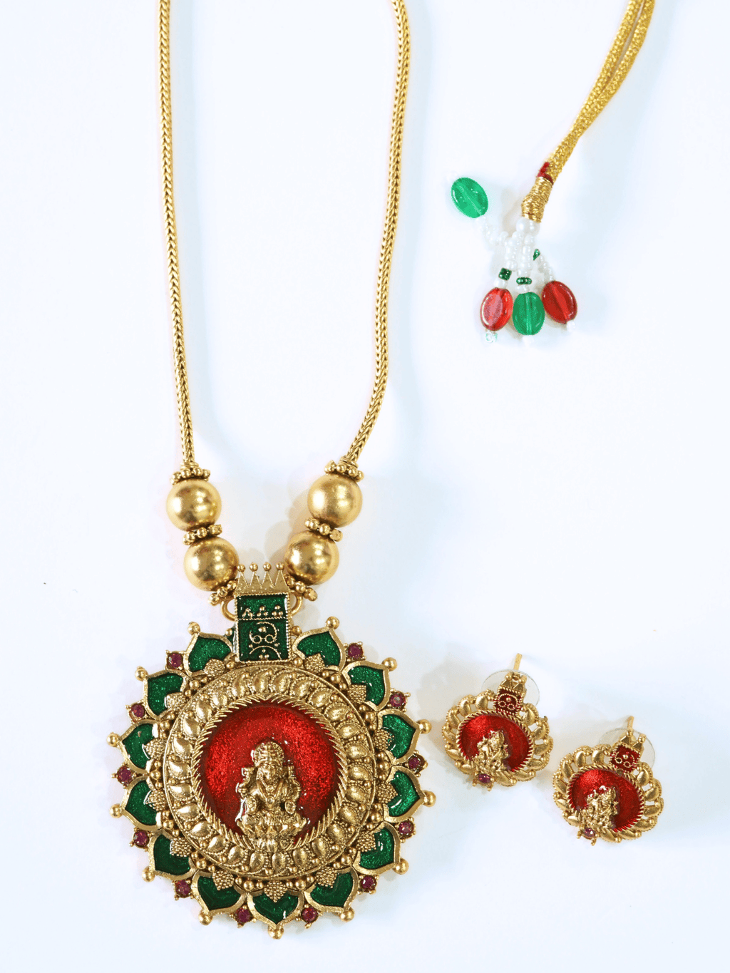 Vibrant Kemp Stone Studded Laxmi Temple Necklace Set