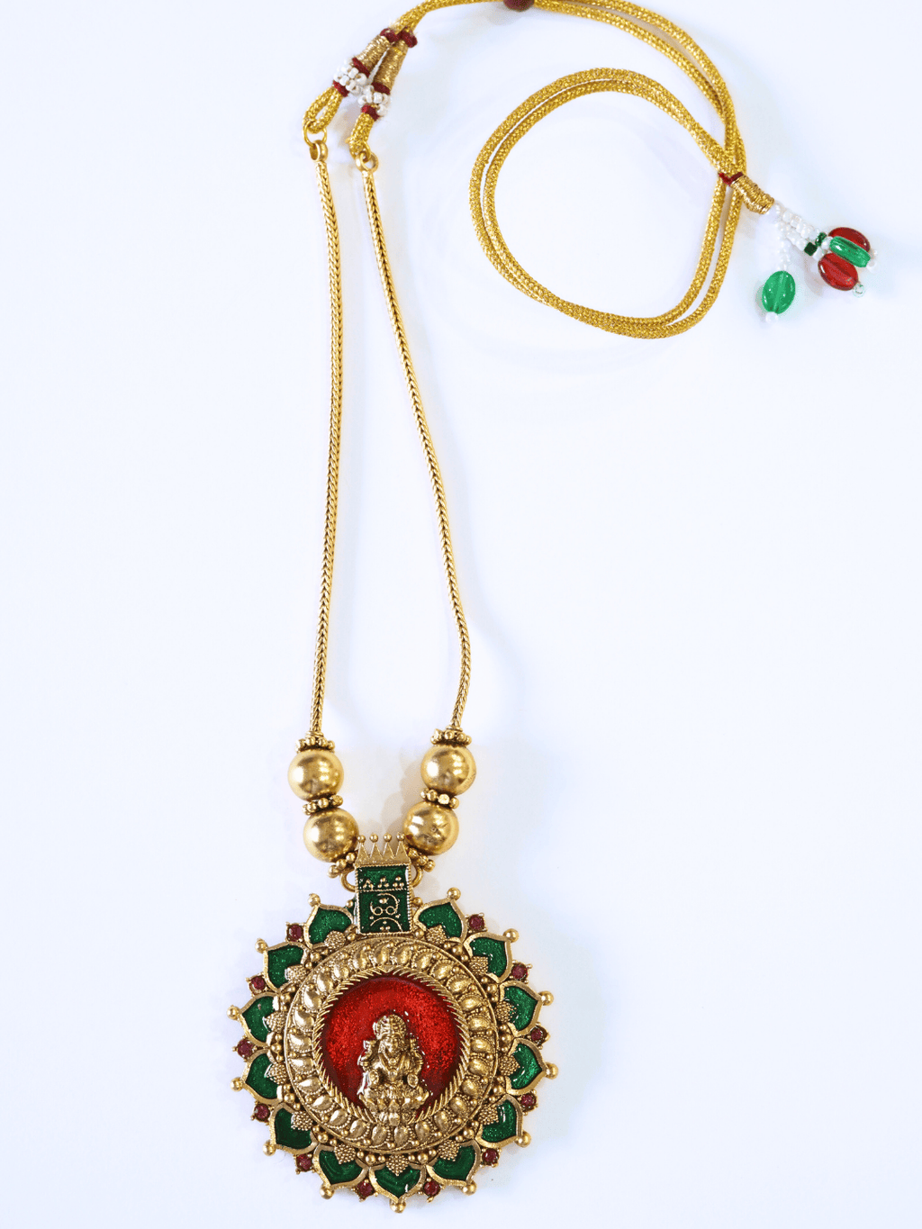 Vibrant Kemp Stone Studded Laxmi Temple Necklace Set