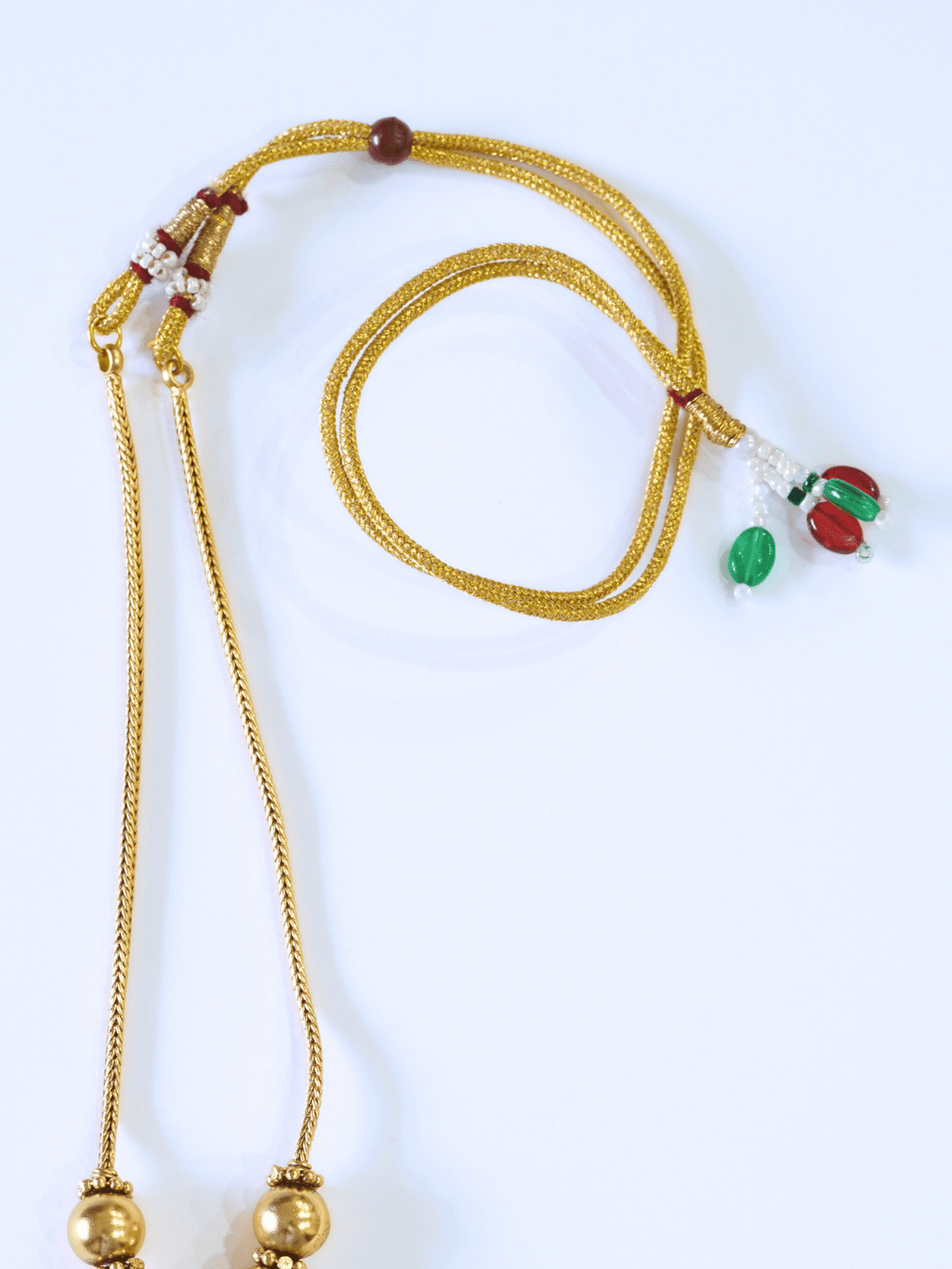 Vibrant Kemp Stone Studded Laxmi Temple Necklace Set