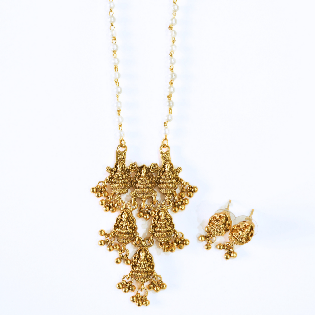 Trendsetting Laxmi Pendant in Pearl String Temple Pendant Set