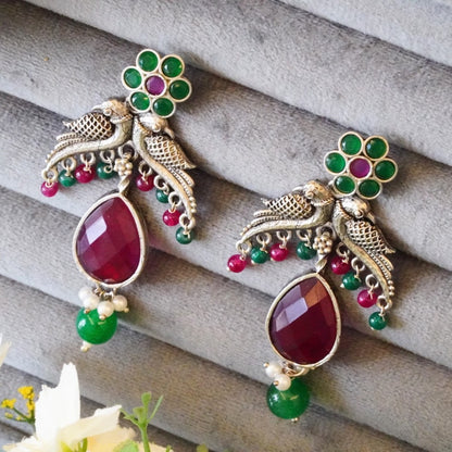 Enchanting Floral Bird Motif Oxidized Dangler Earrings with Lovely Pink & Green Jaipuri Stones & Pearls