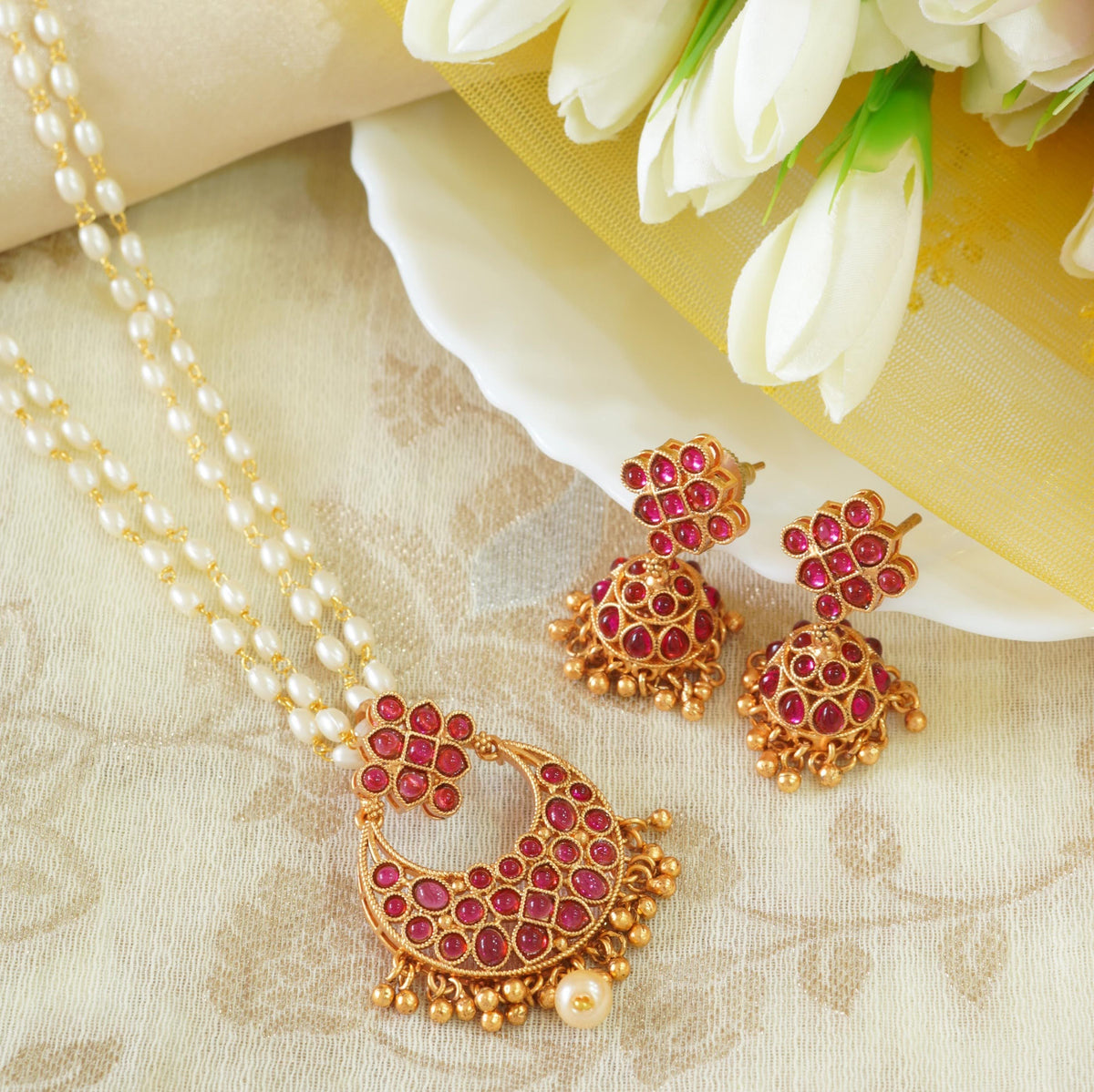 Radiant Ruby Studded Pearl Pendant Set with Jhumkas