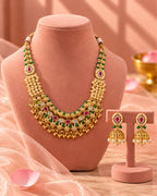 Jadau Traditional Necklace Set with Emerald Pearl and Ruby Detailing