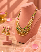 Jadau Traditional Necklace Set with Emerald Pearl and Ruby Detailing