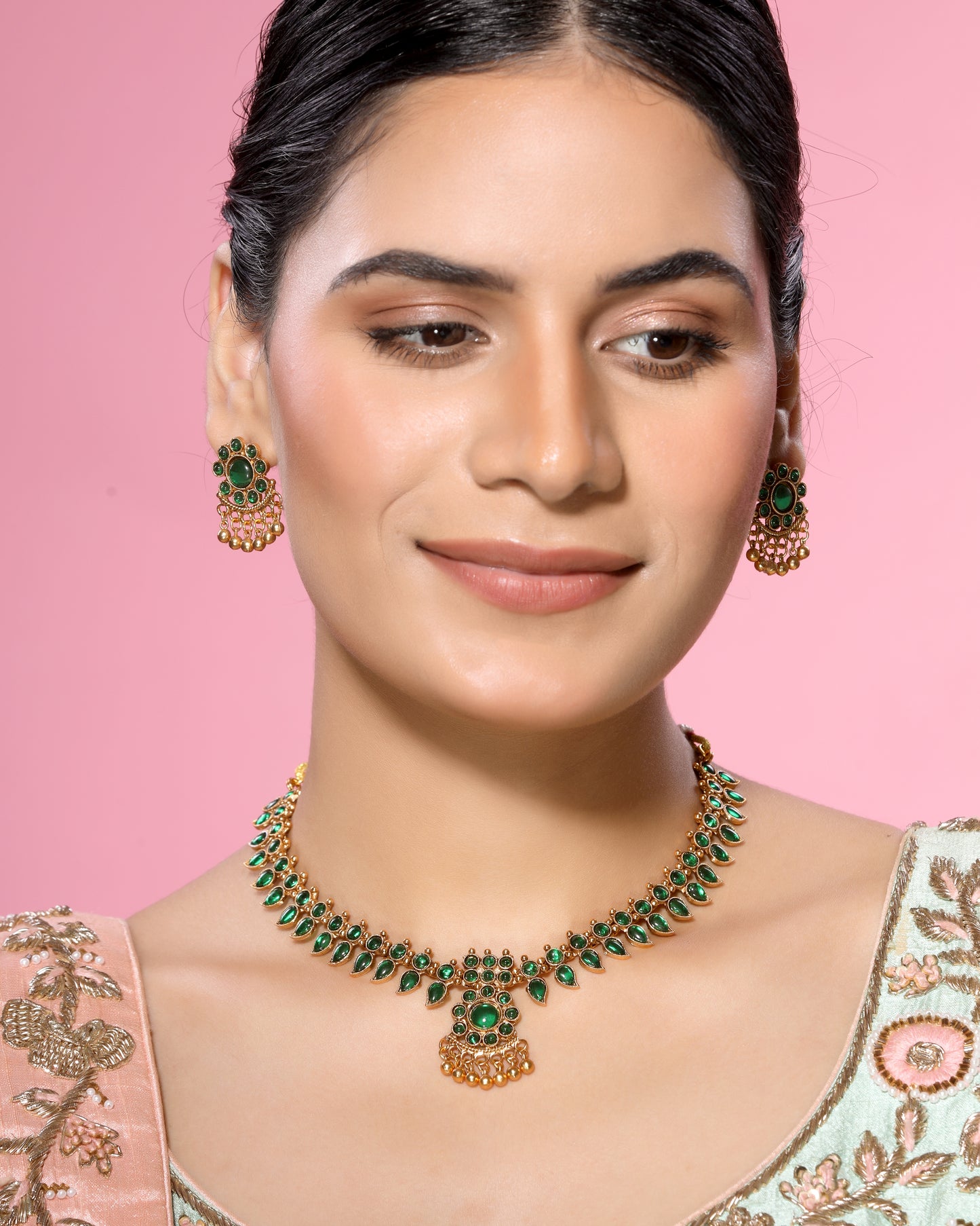 Green Kemp Stone Studded Leafy Pattern Brass Alloy Matte Gold Plated Traditional Necklace Set with Stud Earrings