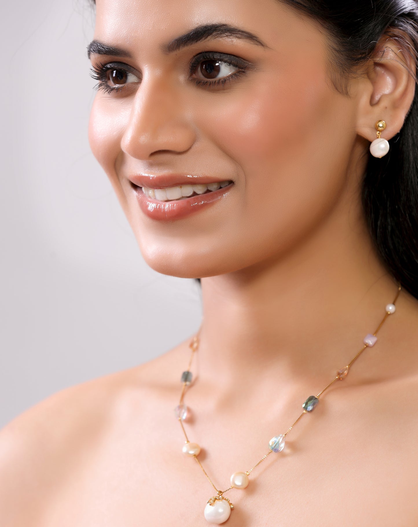 American Diamond Studded Large Pearl with Multicolor Crystals Single Layer Chain Necklace Set with Drop Pearl Earrings