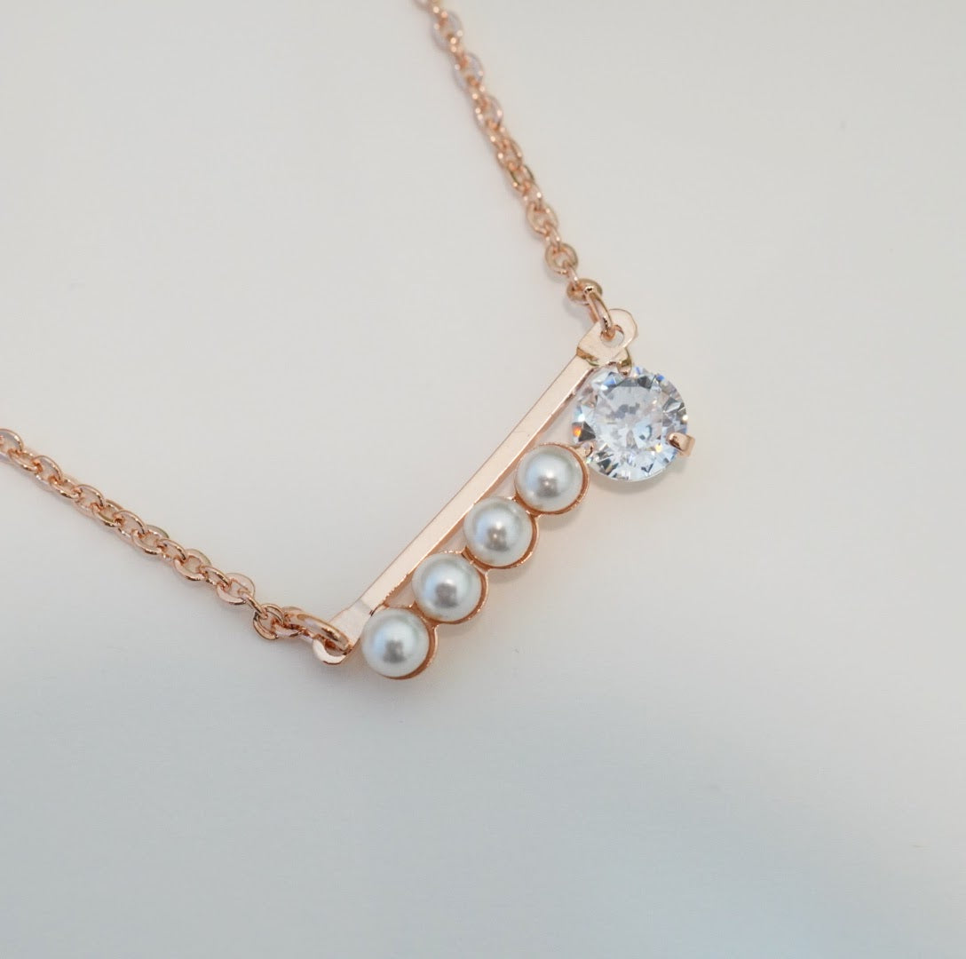 5A Zirconia Solitaire Studded Linear Pearls Chain Pendant Necklace in 18K Rose Gold Plated