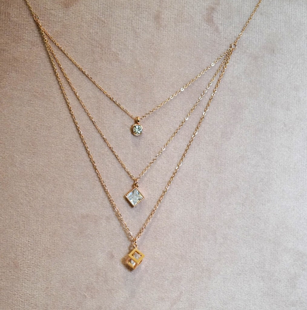 Cubic and Circular Zirconia Pendants in Multi Layered Chain Necklace in 18K Rose Gold Plated Necklace