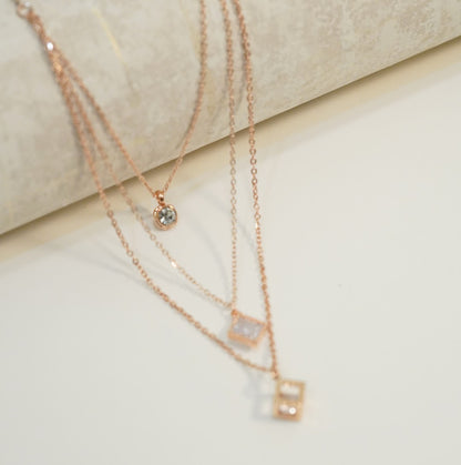 Cubic and Circular Zirconia Pendants in Multi Layered Chain Necklace in 18K Rose Gold Plated Necklace