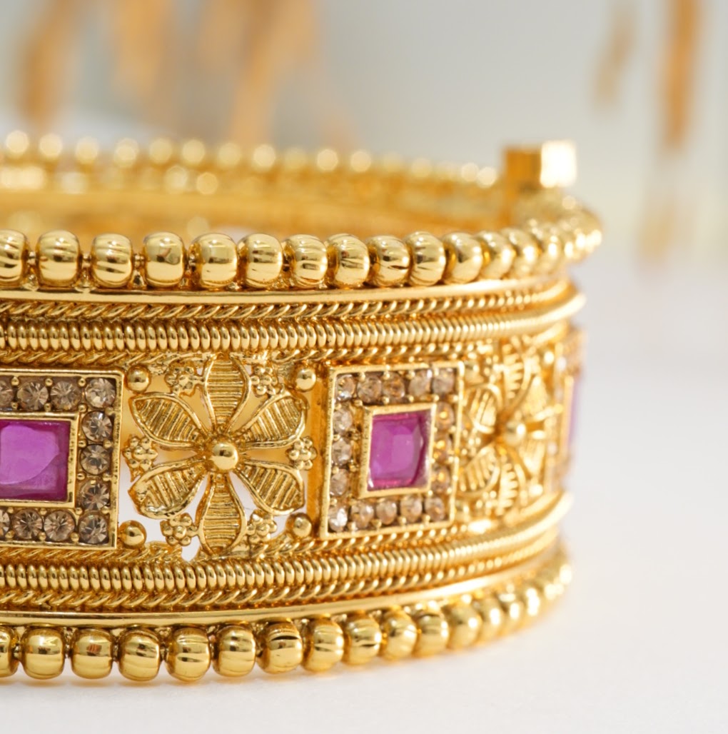 Golden Beaded Edged Ruby Studded Alternate Floral & Square Patterns Openable Traditional Broad Brass Kada in 22KT Gold Plating Matte Finish