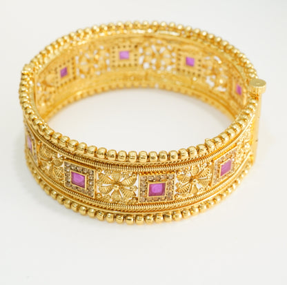 Golden Beaded Edged Ruby Studded Alternate Floral & Square Patterns Openable Traditional Broad Brass Kada in 22KT Gold Plating Matte Finish