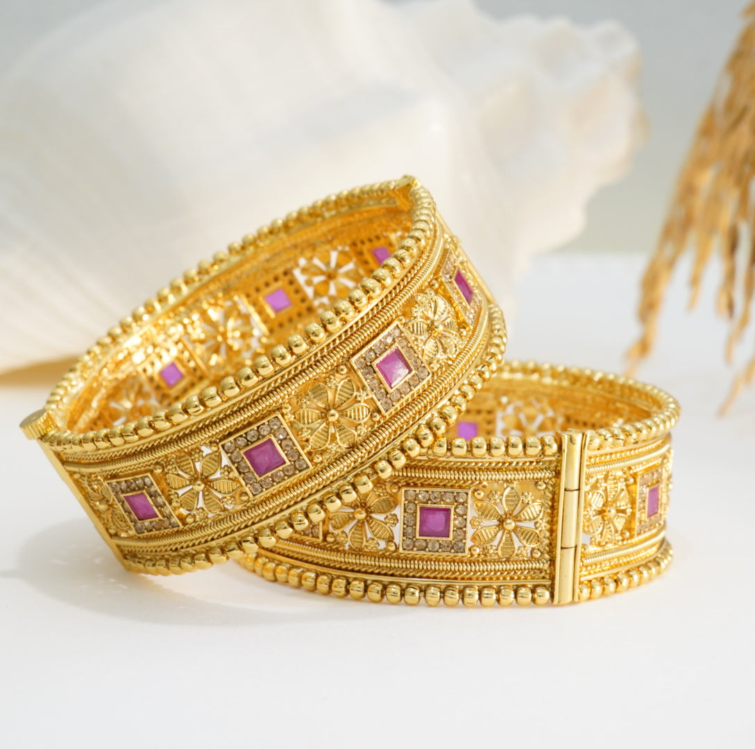 Golden Beaded Edged Ruby Studded Alternate Floral & Square Patterns Openable Traditional Broad Brass Kada in 22KT Gold Plating Matte Finish