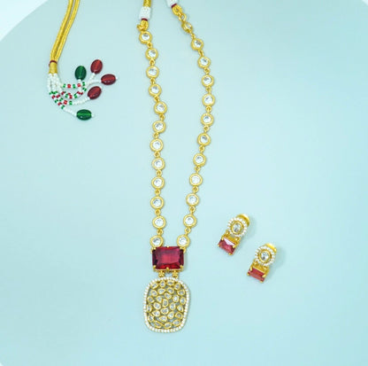 Indo-Western Cum Traditional Brass Pendant Chain Necklace Set Studded with Zirconia, Crystals and Statement Bold Red Crystal with Stud Earrings